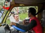 Pj Gubernur Sumsel Agus Fatoni ketika menghentikan mobil truk di jalan Palembang Betung
