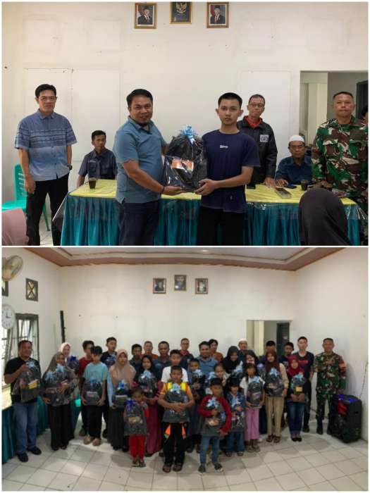 Kepala Desa Tanjung Baru, Subri Bustan ST menyerahkan bantuan sosial Paket Perlengakapan Sekolah secara simbolis kepada anak yatim piatu, Jumat (01/08/2025). foto andi